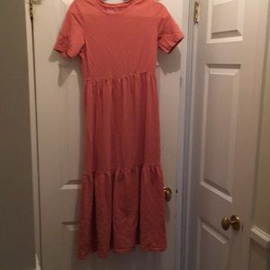 This has never been worn. It is tiered maxi dress.